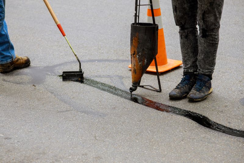 Applying Asphalt Sealant